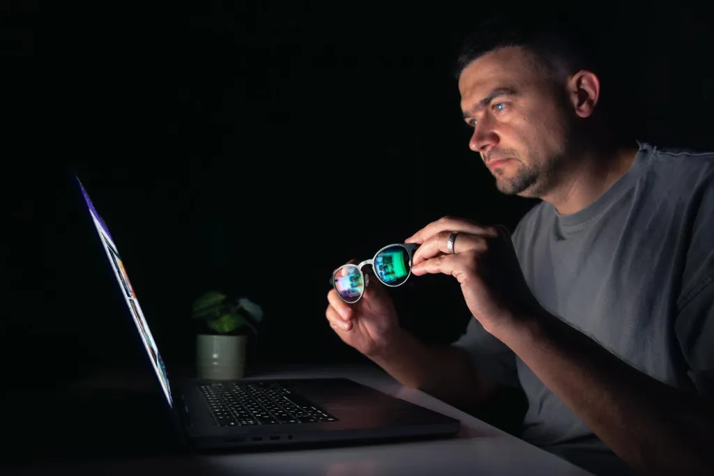 young-man-works-computer-night.jpg